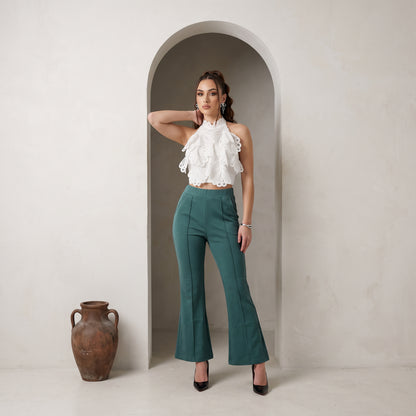 Bottle Green Bell bottom. Made from Imported Lycra Fabric, it has pintex design on the front and has no pockets and zipper