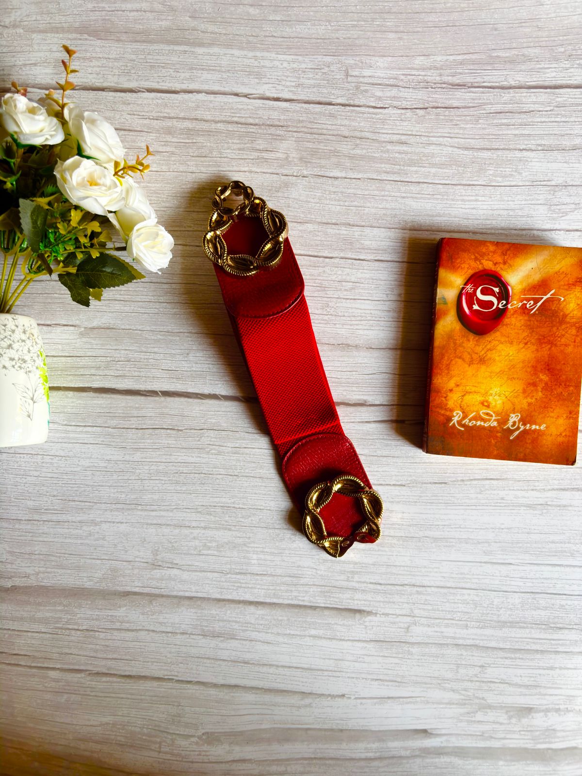Cherry Maroon elasticated waist belt with bold golden buckle for women