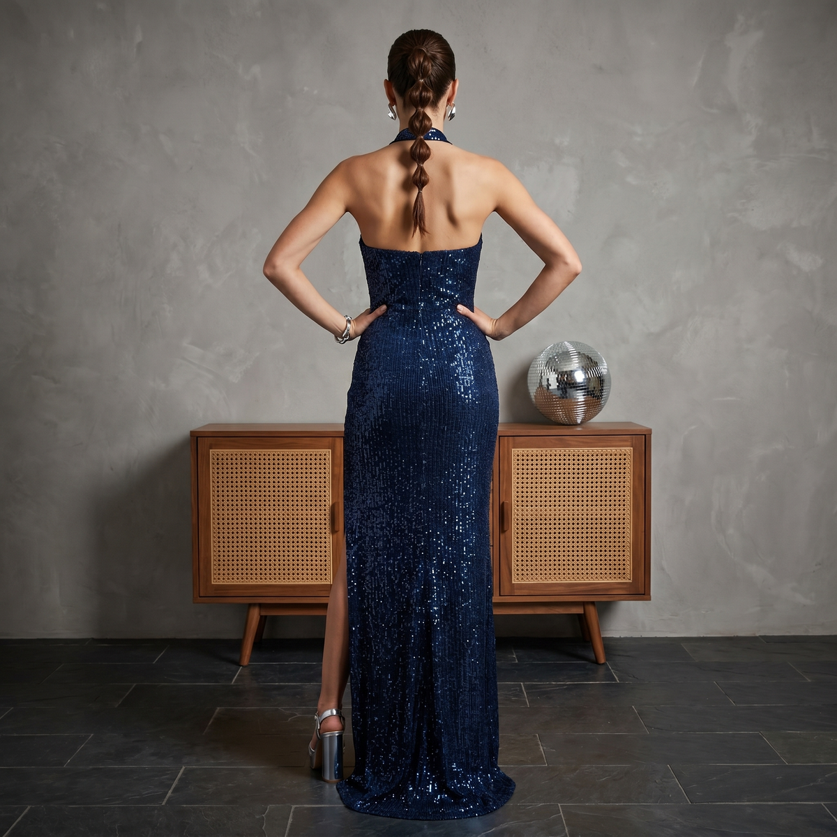 Shimmer Sequence Halter neck Full Length Dress with Side Slit in Navy Blue colour. It a Bodycon style strecthable dress and will fit from Bust Size 30-36 inches.